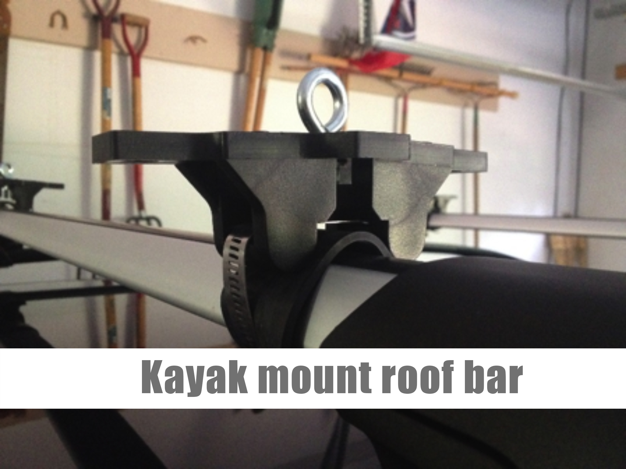 Kayak mounted to roof bar Quick Fist Clamps